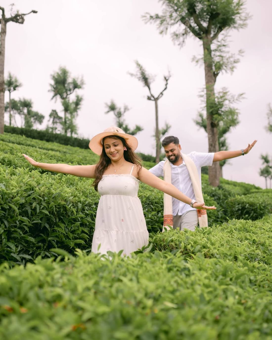 Couple on a honeymoon in a Wayanad tea garden